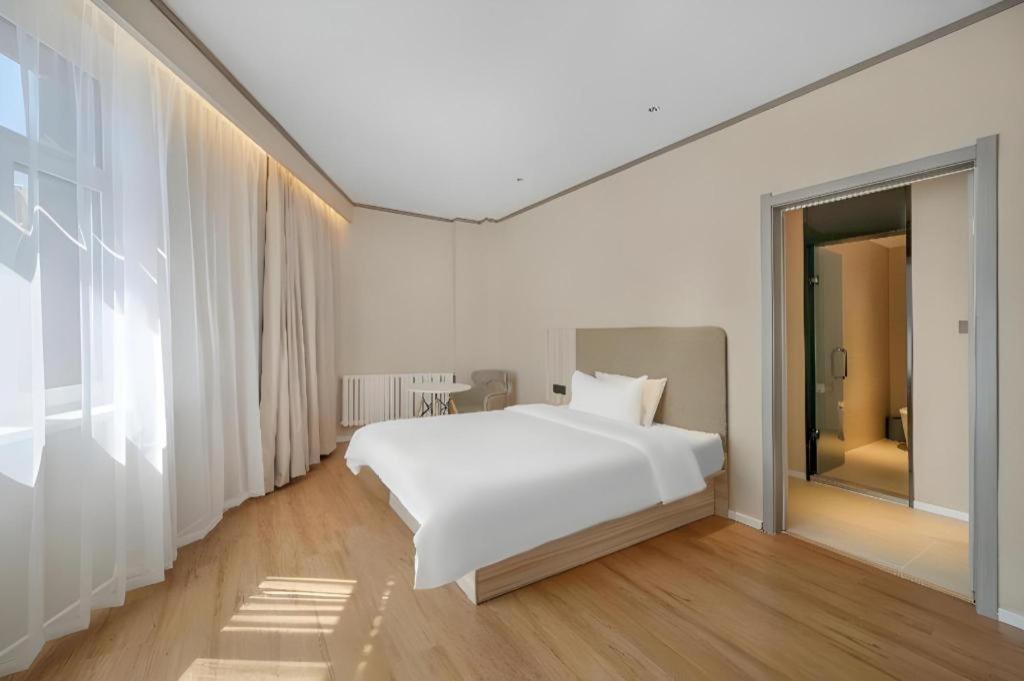 ฮั่นถิง โฮเต็ล ฮาร์บิ้น ตงต้าจือสตรีท ฉิวหลิน Hotel ฮาร์บิน ภายนอก รูปภาพ