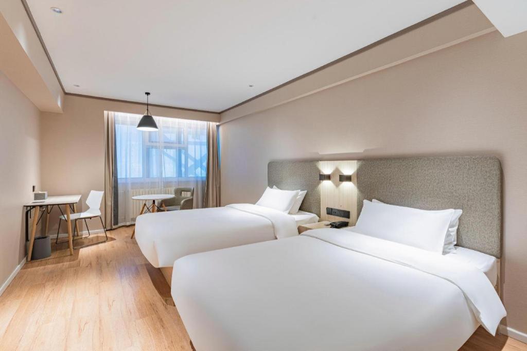ฮั่นถิง โฮเต็ล ฮาร์บิ้น ตงต้าจือสตรีท ฉิวหลิน Hotel ฮาร์บิน ภายนอก รูปภาพ