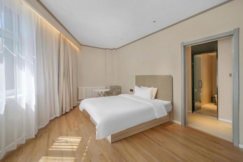 ฮั่นถิง โฮเต็ล ฮาร์บิ้น ตงต้าจือสตรีท ฉิวหลิน Hotel ฮาร์บิน ภายนอก รูปภาพ
